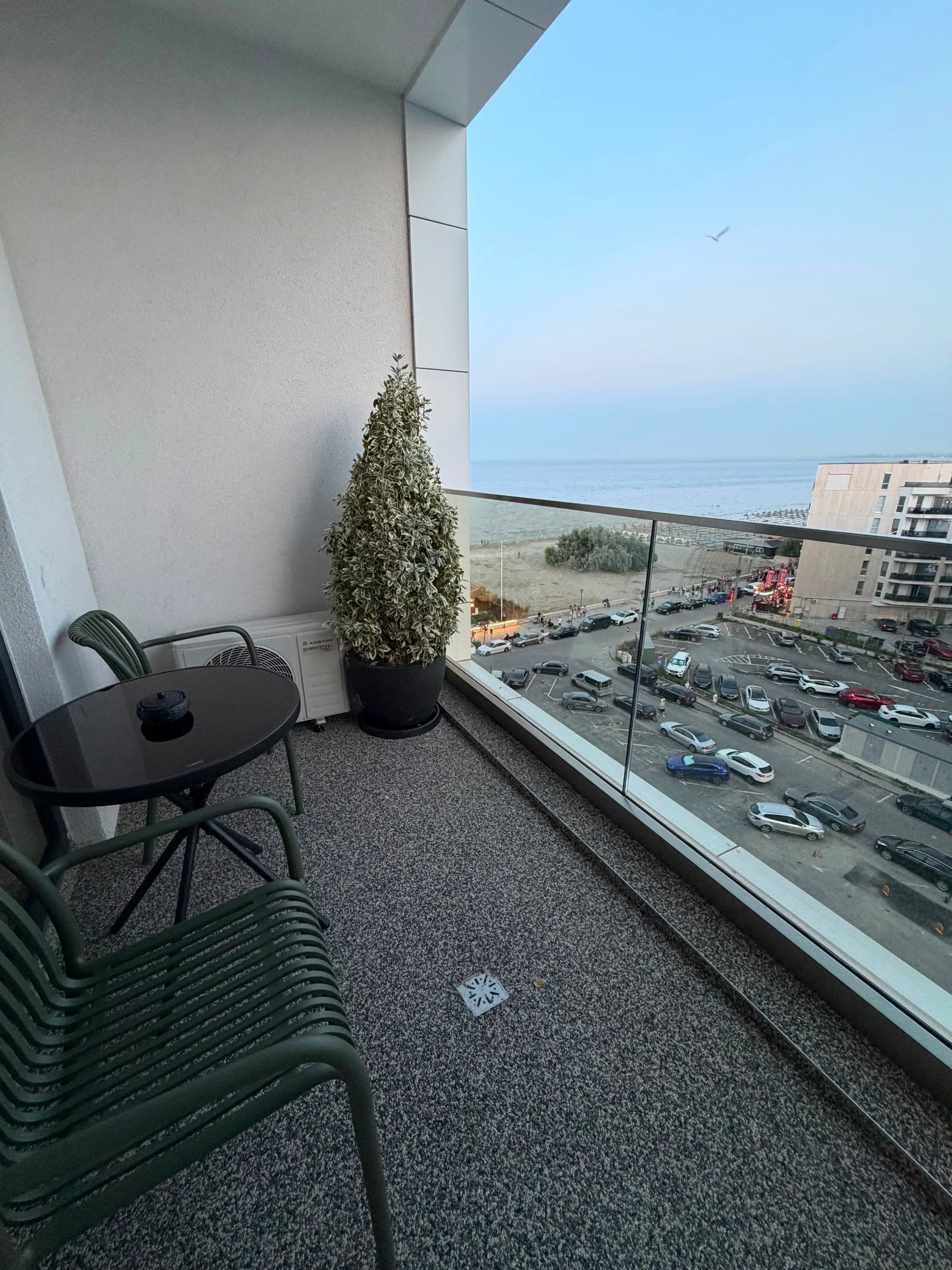 The balcony at dusk, with the sea fading into the horizon